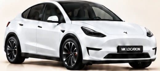 Tesla Model Y blanche, vue de trois quarts avant